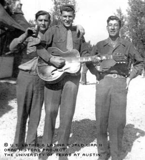 Valentin Aguilar guarding German prisoners near Naples, Italy in 1945 along with other members of the 78th Ordinance.