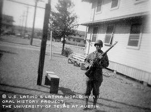 Ruben Casillas, getting ready for guard duty at Camp Robertson.