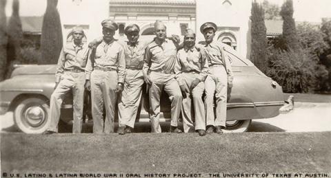 Rafael Flores photographed with members of his tank platoon. The photo was taken at Fort Ord, California in 1944. In this photo, they were celebrating the end of their special training and imminent deployment overseas.