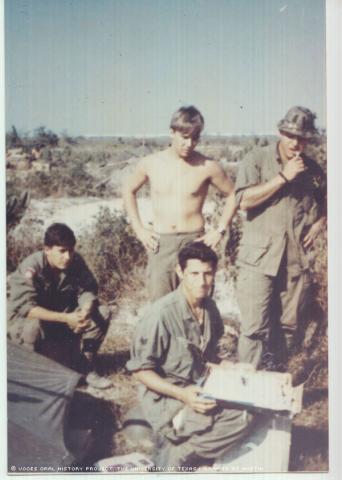 George Anya (KIA), Leo Orona, Ben, and Country (KIA) outside Hue Nean the Ashu Valley. Nov 1969. Celebrating Ben's birthday.\My mom sent me a cake.\""