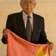 Luis Landin displays a Viet Cong flag at the AT&T Executive and Conference Center, University of Texas, Austin on Saturday, October 3, 2009. Mr. Landin attended our 10th anniversary and was interviewed by Raquel Garza. (Photo: Marc Hamel)