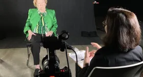 Voces Director, Maggie Rivas-Rodriguez, interviewing Petrita Sanchez in a professional studio setting.