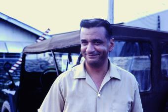 Portrait of José Luis Aliseda in a collared shirt smiling 