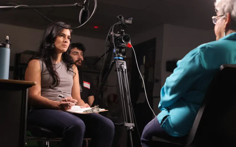 Woman being interviewed