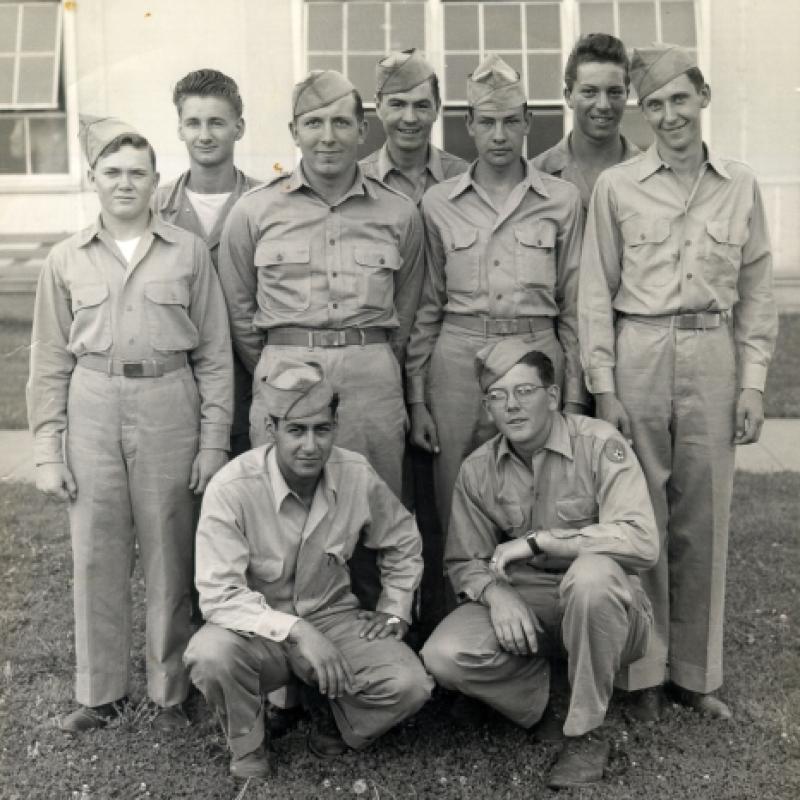 Joe (left kneeling down).  The picture was taken early in 1946 at Scott, Field, in Villerville, Illinois-now called Scott Airforce.  The abbreviation Tele Type Mechanic (T.T.M.) 426.