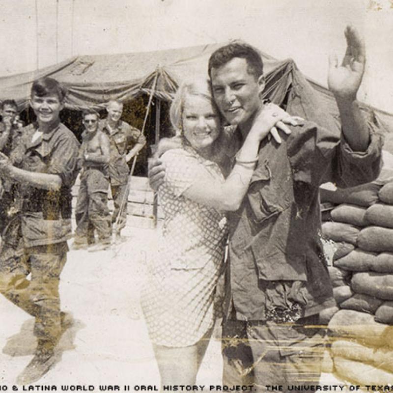 Henry Soza photographed with a Donut Dollie Red Cross volunteer in Vietnam on April 21, 1969.