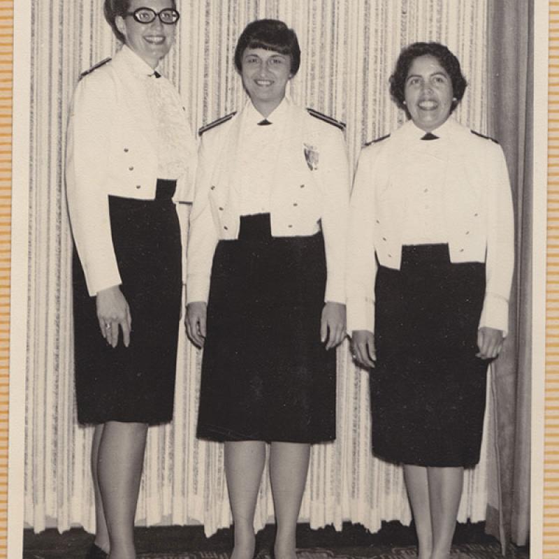 2 A/E Nurses at the Tachi\O\"Club in 1967.\"By the order of the base/hosp commander - all officers on base are attending a dinner at the\"O\"Club in\"Dress Mess\"Uniforms.\""